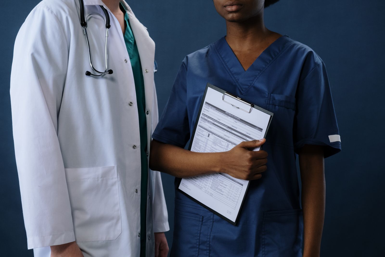 Healthcare professionals wearing medical scrubs